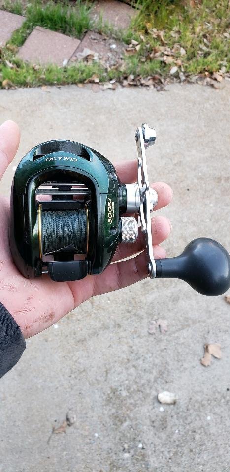 green shimano curado MGL 70 K Baitcasting Reel - CUMGL70XGK free K guides with FazLite inserts is the ideal guide train for reducing line tangles and providing anglers the option to fish with monofilament Shimano Curado DC Casting Reel