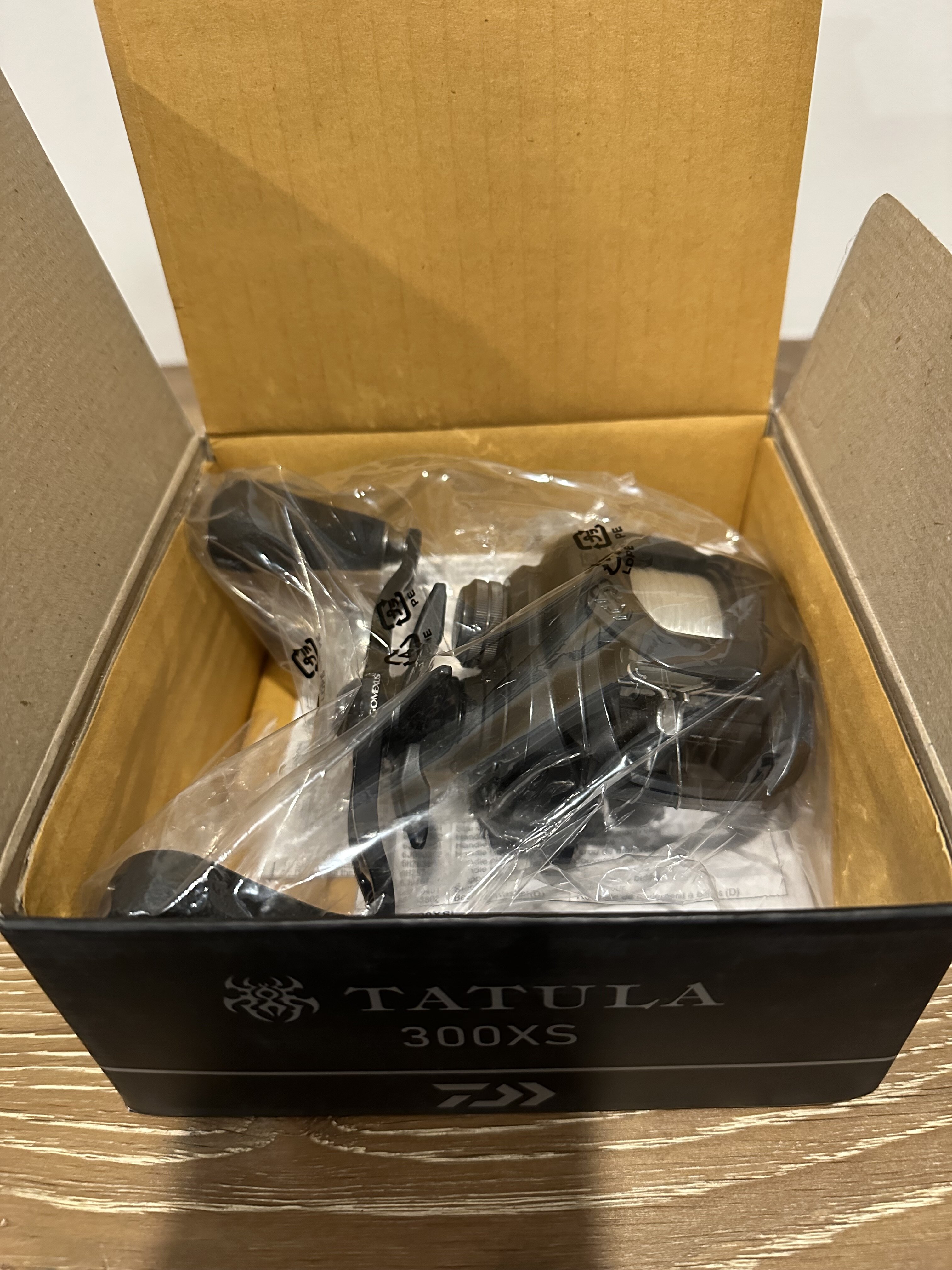 Daiwa Tatula 300 XS with Gomexus Handle nearly new in box - Black