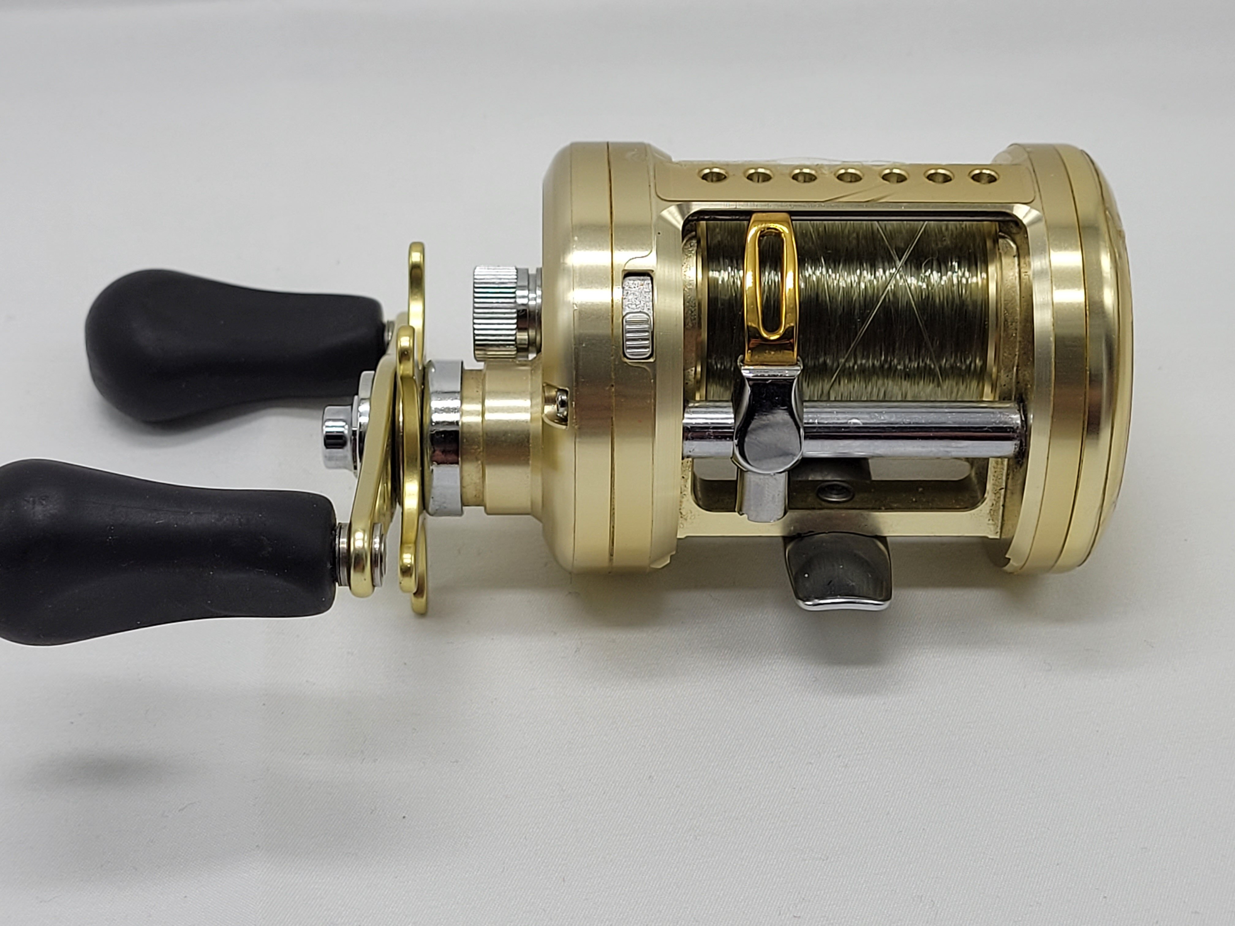 TEAM DAIWA LUNA 300 Gold Baitcasting Fishing Reel Used. Read