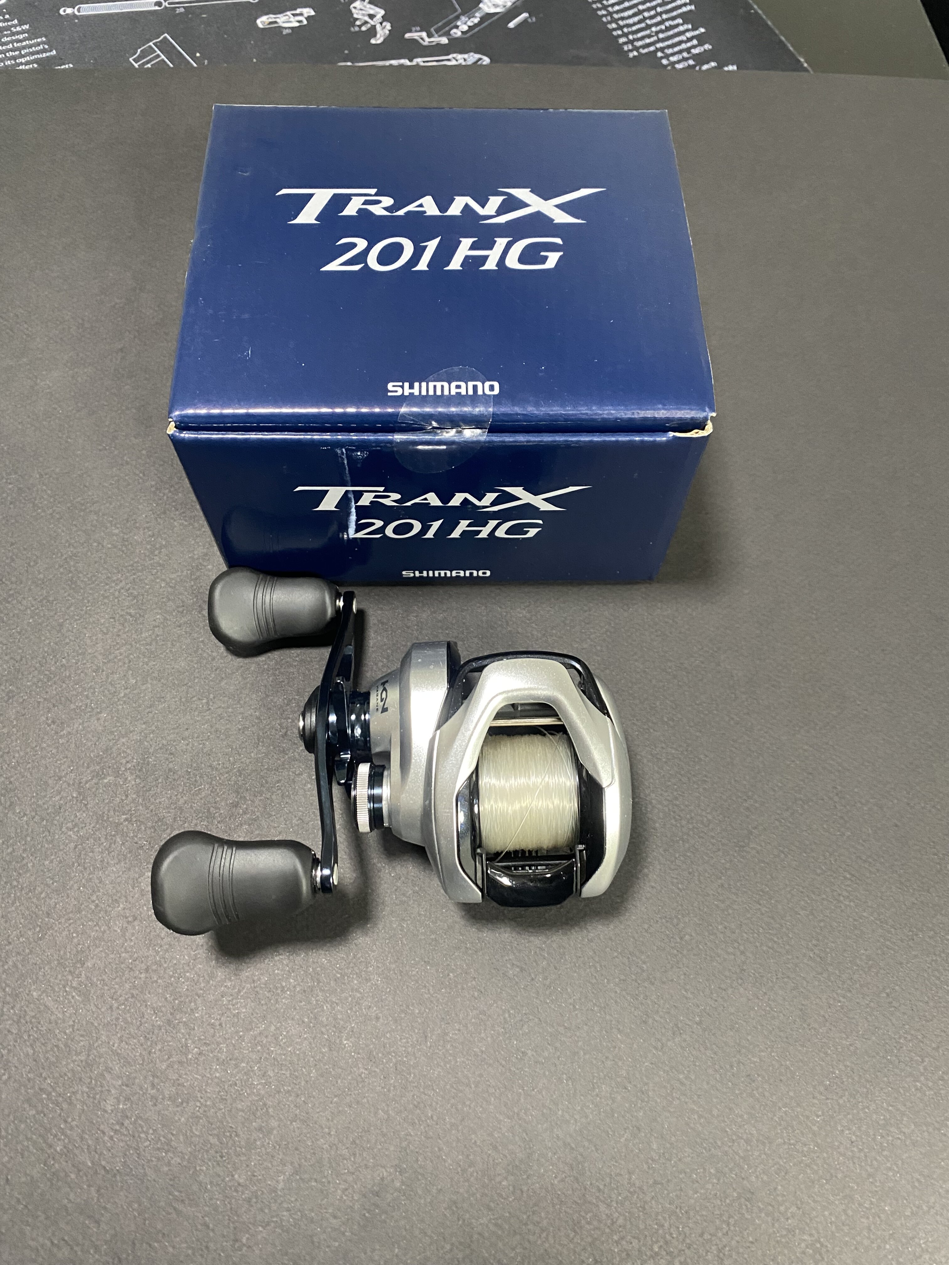 Shimano Tranx 201HG - Black Market - Swimbait Underground